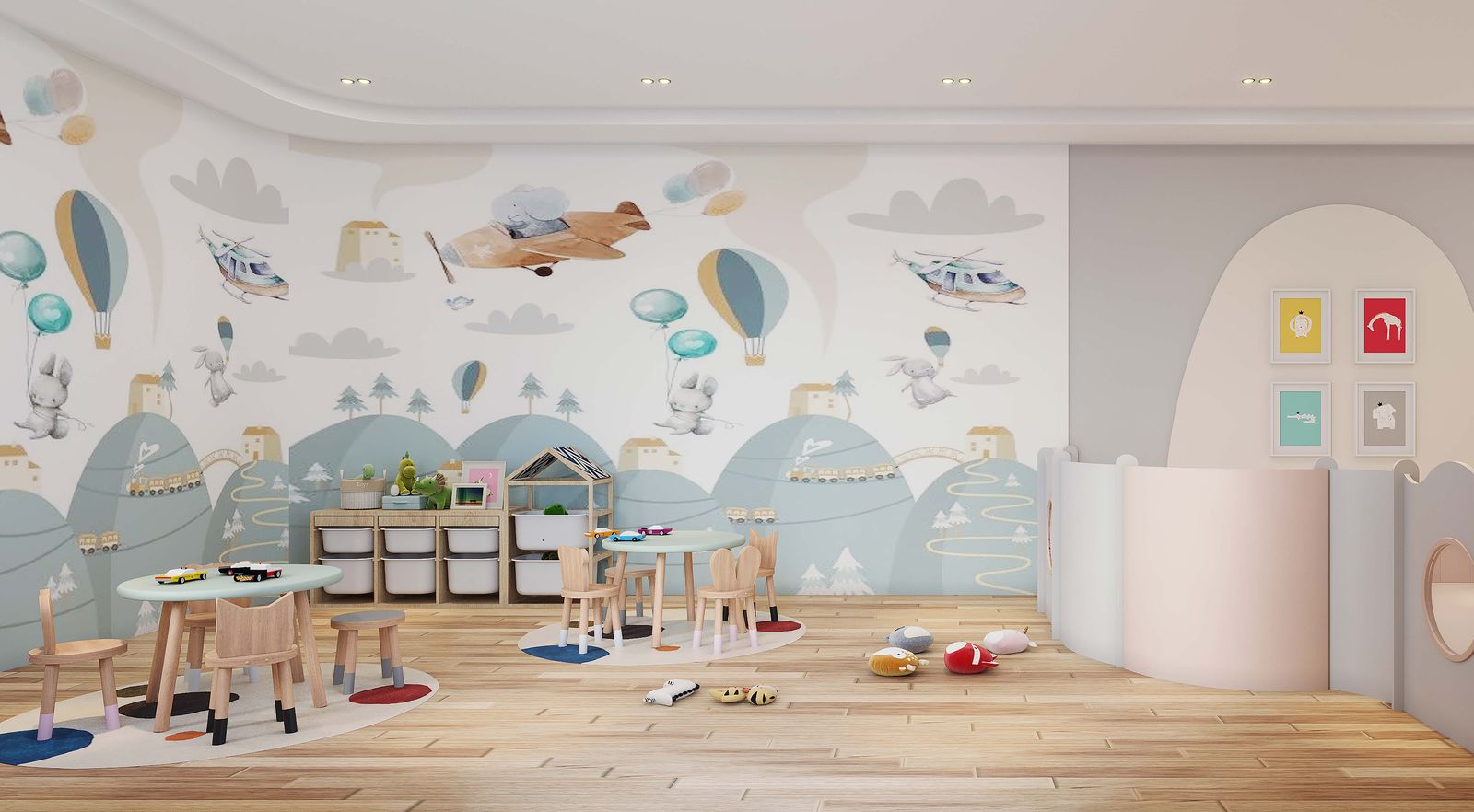 Kids playroom with play tables and murals